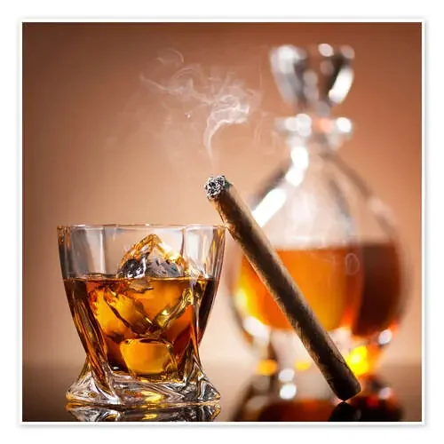 Cigar on glass of whiskey with ice cubes Editors Choice